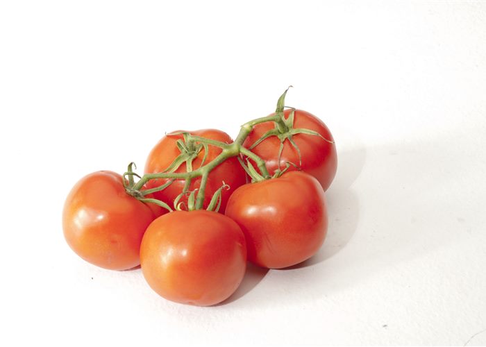 Whole tomatoes on the vine