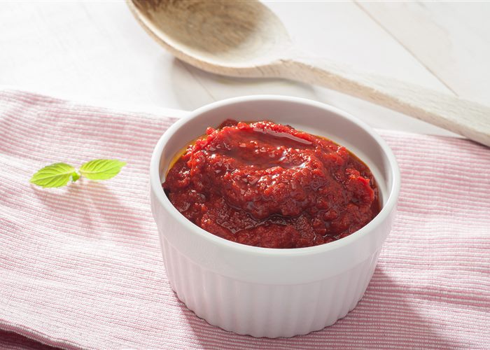 A bowl of marinara sauce